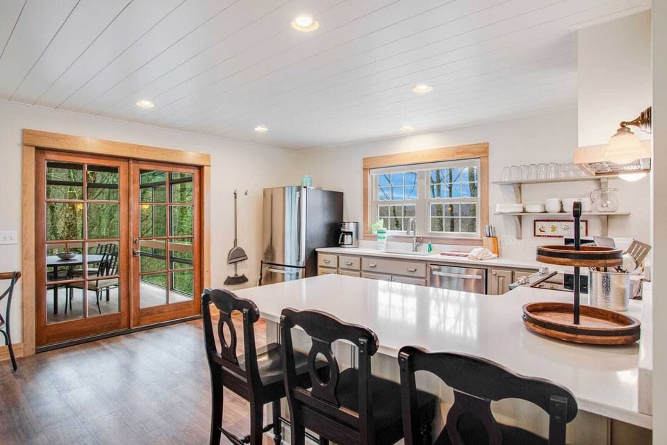 Open Kitchen and Dining Area with access to the All-Season Room