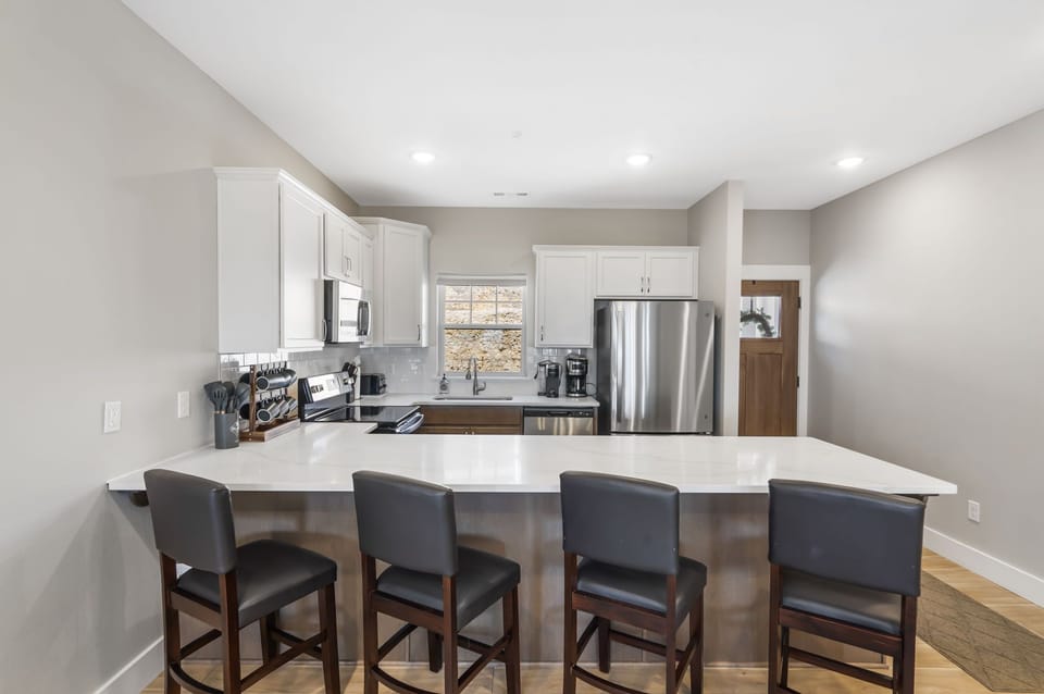 Full Kitchen with Additional Bar Seating