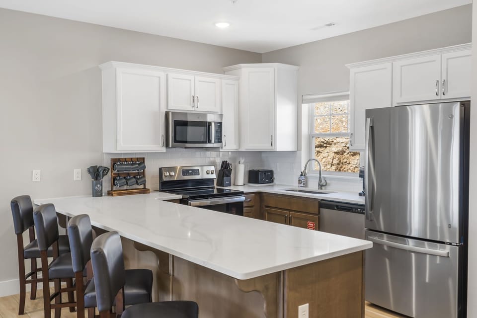 Full Kitchen with Additional Bar Seating
