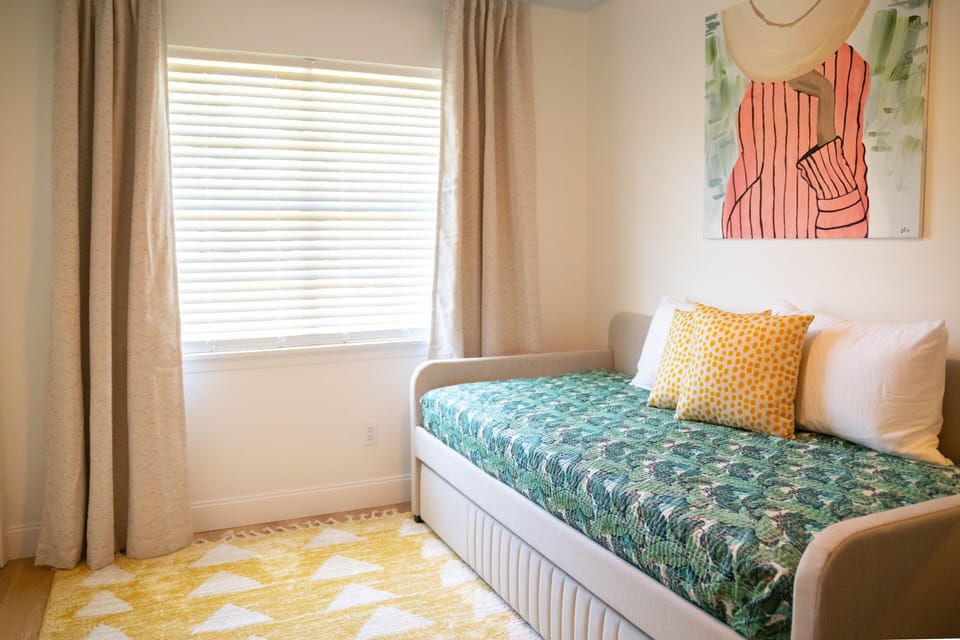 Trundle bed that houses two twins