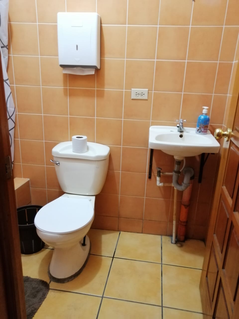 Economy Room, 1 Bedroom | Bathroom | Combined shower/tub, rainfall showerhead, towels, soap