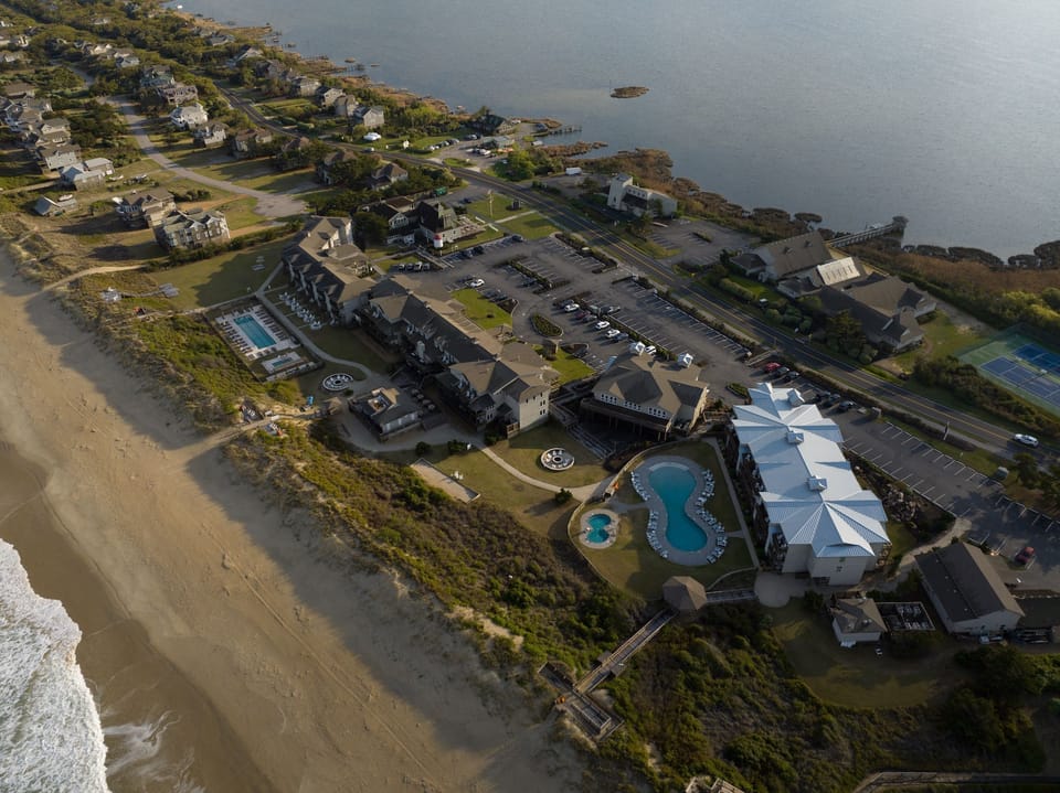 Explore the beachfront boardwalk and pathways leading directly to the shore