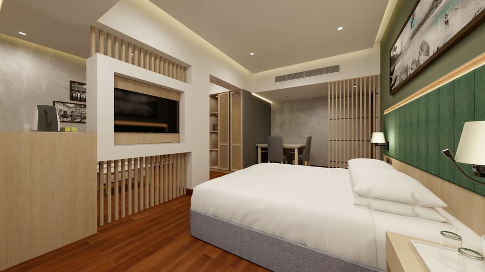 Junior Suite | Premium bedding, minibar, in-room safe, blackout drapes