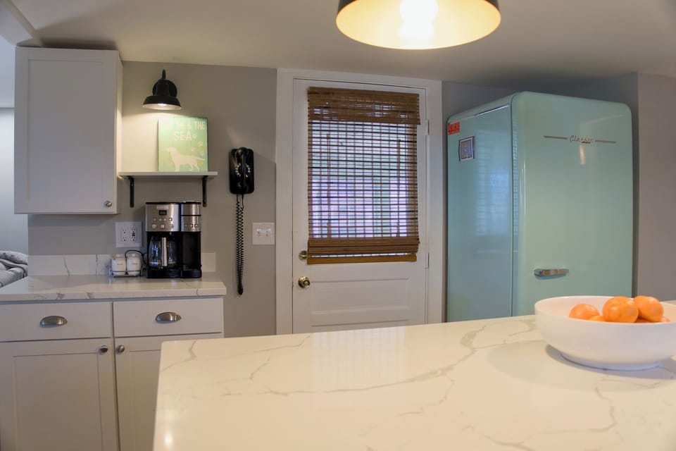 Kitchen coffee bar and retro refrigerator.