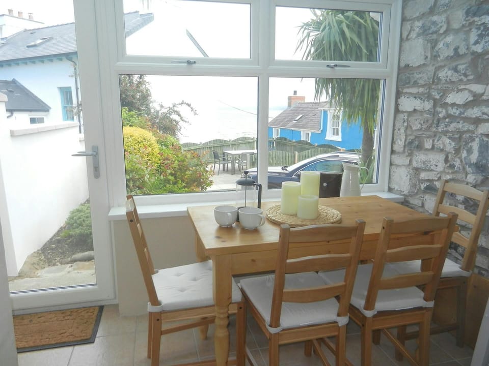 Dining area with table and four chairs