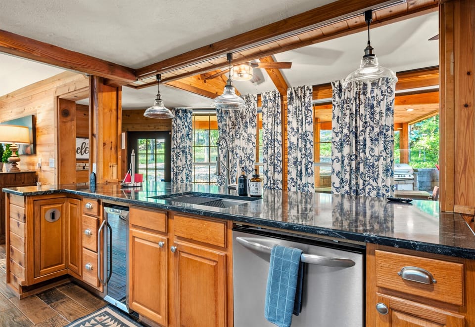 This spacious kitchen is perfect for preparing meals and entertaining guests, with ample counter space.