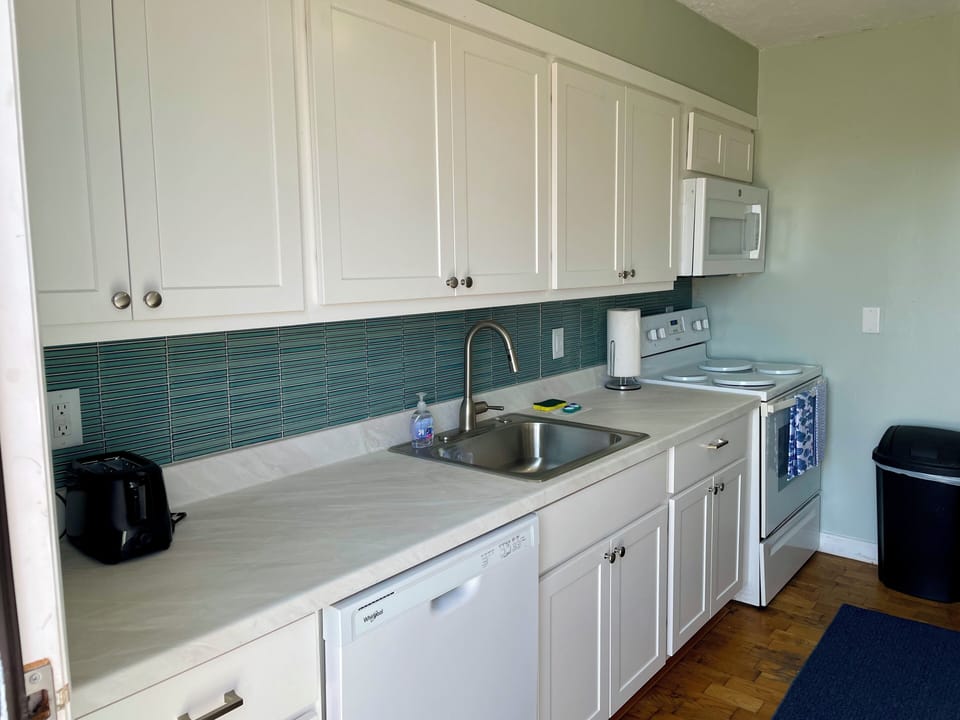 Kitchen has all you need! Also has a full sized dishwasher, stove, fridge