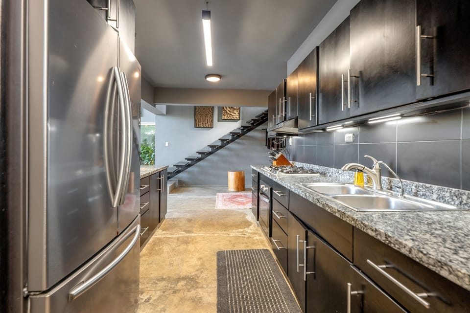 Clean kitchen with all the essentials ready to use.