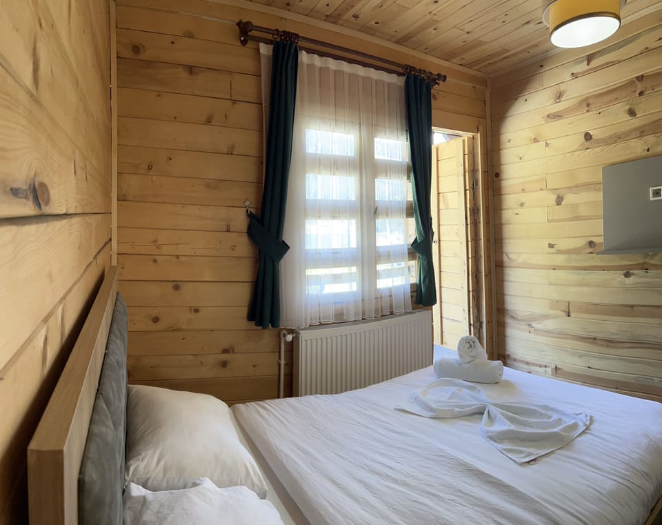Family Quadruple Room, Multiple Beds | Laptop workspace, blackout drapes, free WiFi