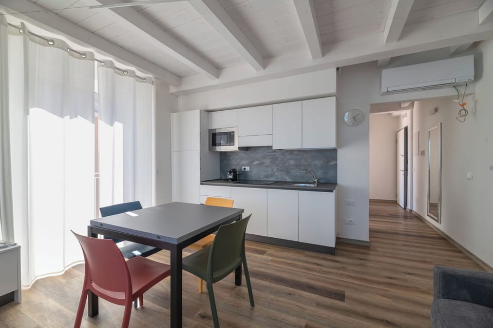 Superior Apartment, Sea View | Living area | Flat-screen TV