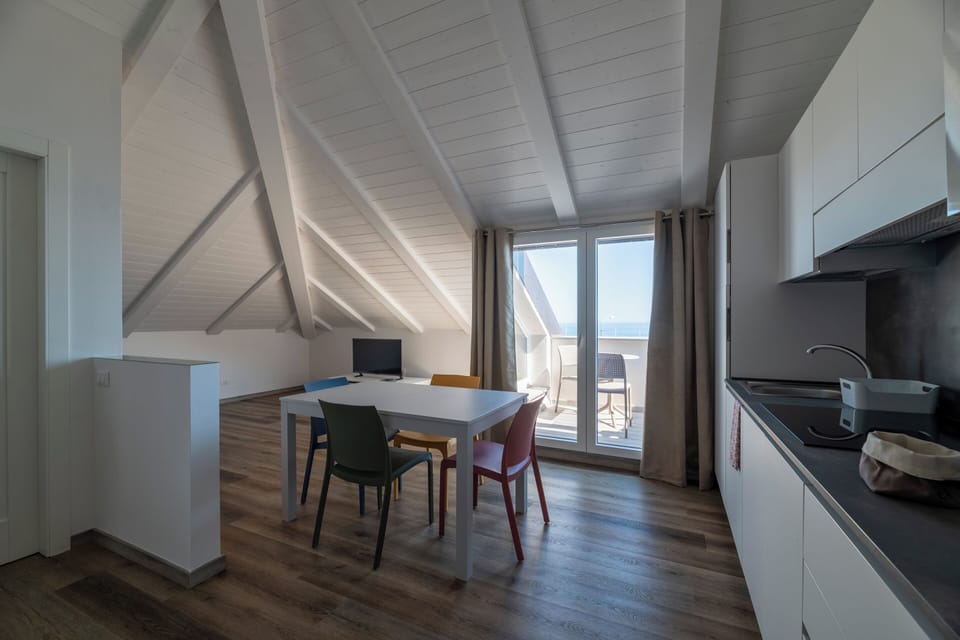 Superior Apartment, Sea View | Living area | Flat-screen TV