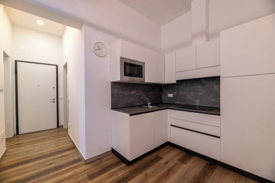 Family Apartment | Private kitchen | Fridge, microwave, oven, stovetop