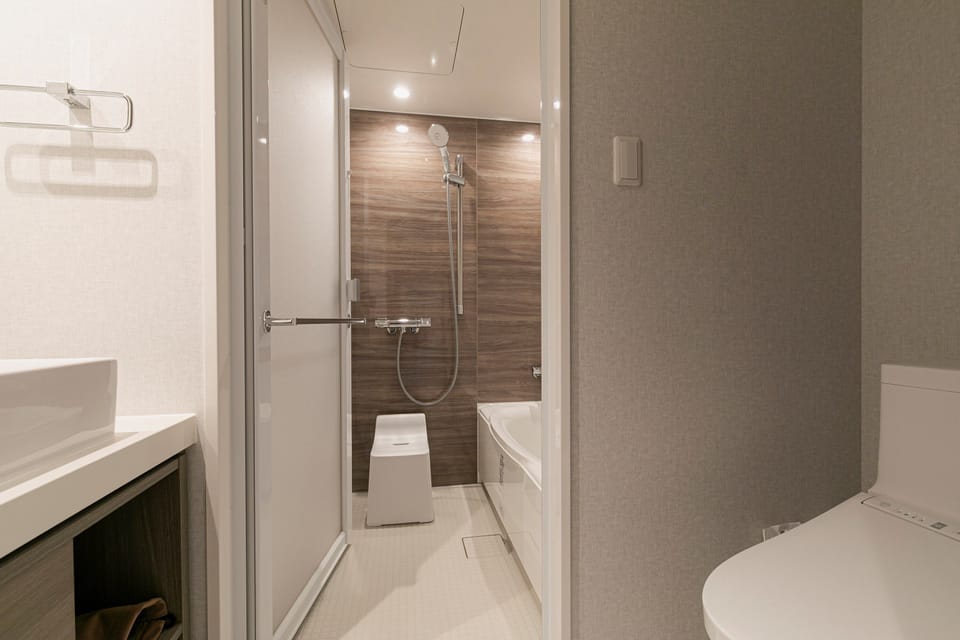 Free toiletries, hair dryer, slippers, electronic bidet
