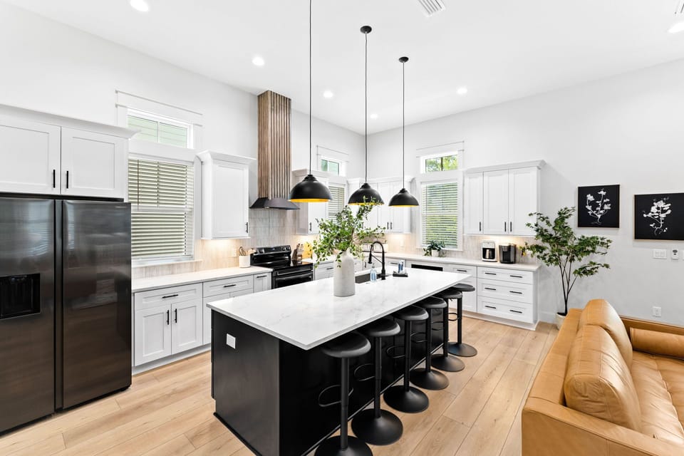 The classic kitchen is bathed in sunlight.