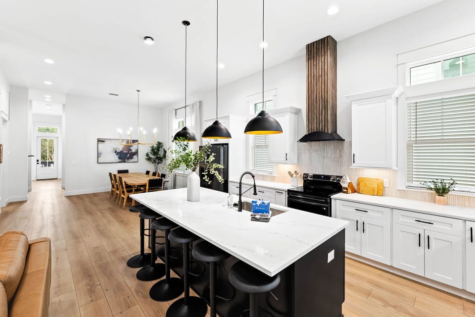The kitchen island offers additional seating.