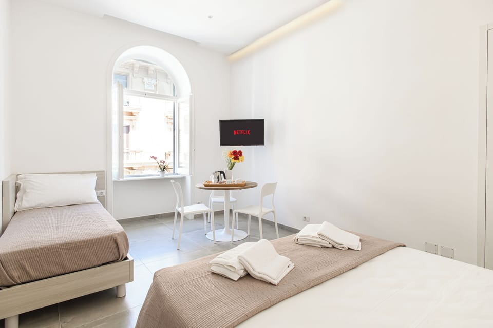 Superior Room, Partial Sea View | In-room safe, desk, laptop workspace, blackout drapes