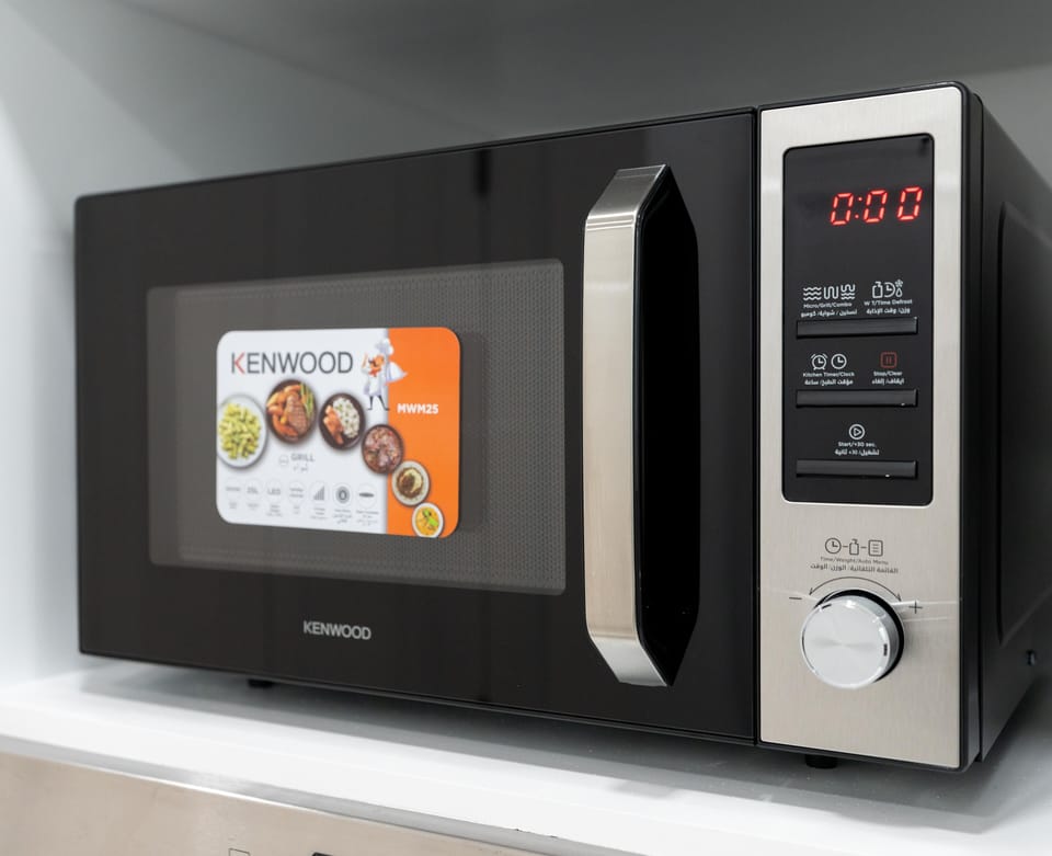 Elite Apartment, Balcony, City View | Private kitchen | Fridge, microwave, oven, dishwasher