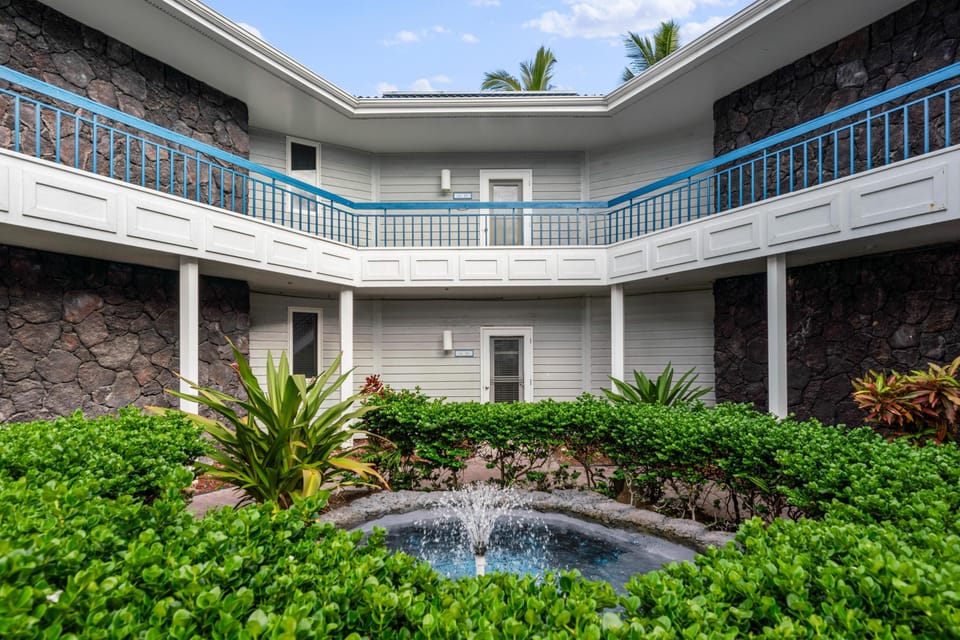 Top-floor unit offering extra privacy, quiet surroundings, and scenic views.