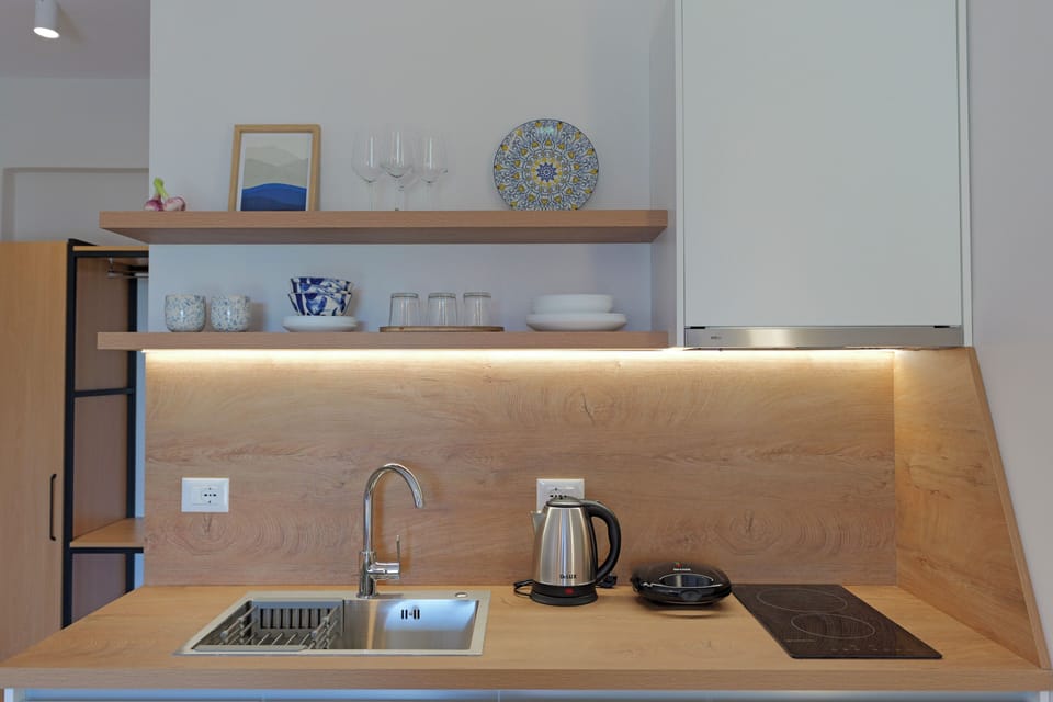 Apartment, Sea View | Private kitchen | Fridge, stovetop, toaster, cookware/dishes/utensils