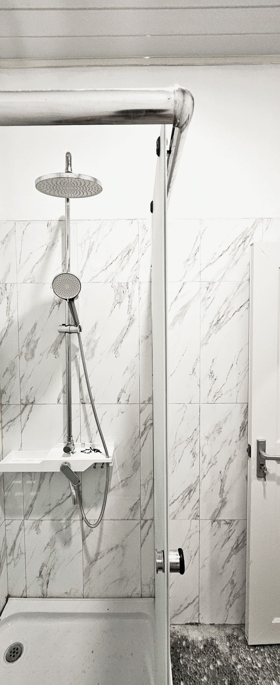 Shower, rainfall showerhead, towels, soap