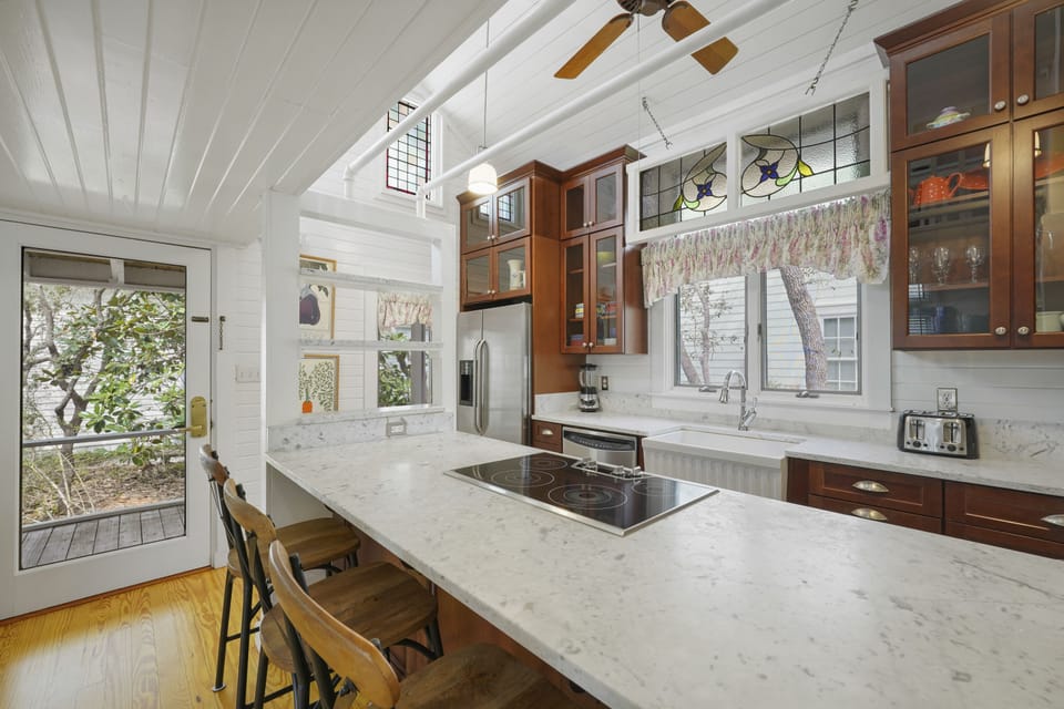 UPDATED KITCHEN NEXT TO SCREENED PORCH ACCESS