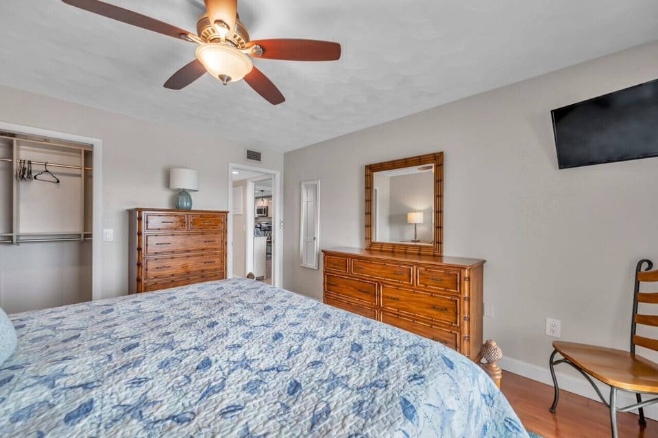 Relaxing bedroom view w/ classic furniture and an uncluttered, restful layout.