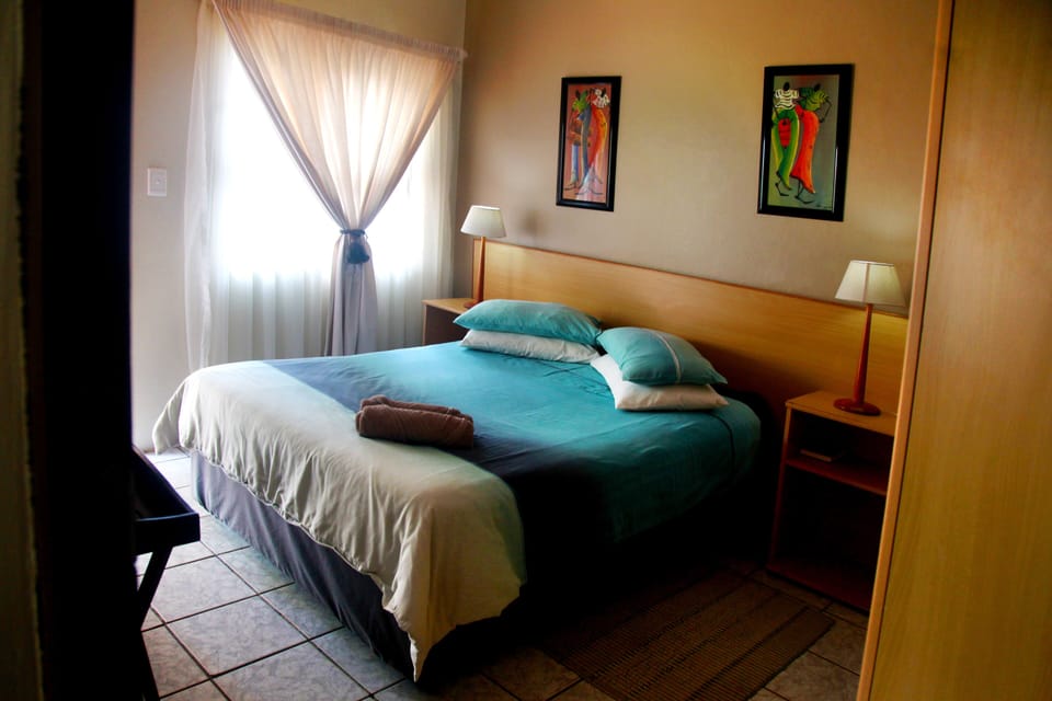 Basic Double Room | In-room safe, bed sheets