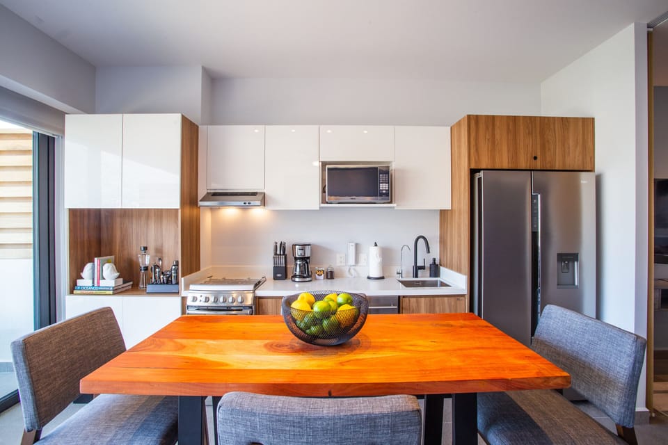 Kitchen amenities include a full-size fridge, stove, oven, microwave, dishwasher and filtered water