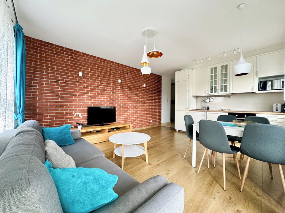 Superior Apartment, 3 Bedrooms | Living room | Flat-screen TV