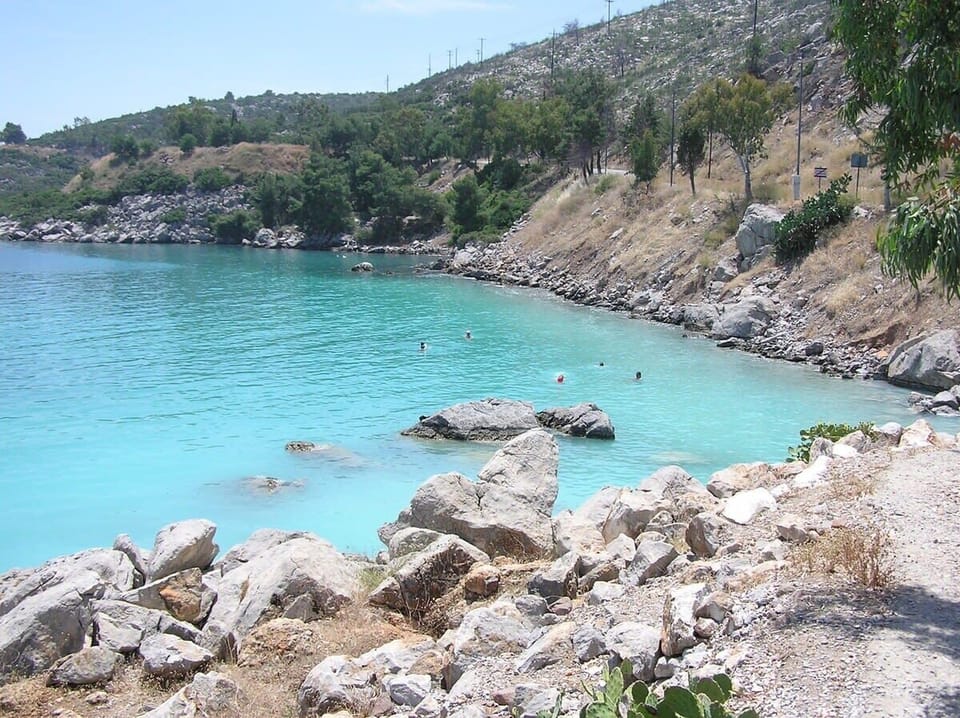 Secluded Methana Beach – Just 12km Away
Ideal for a quiet beach day with stunning cliffside views.