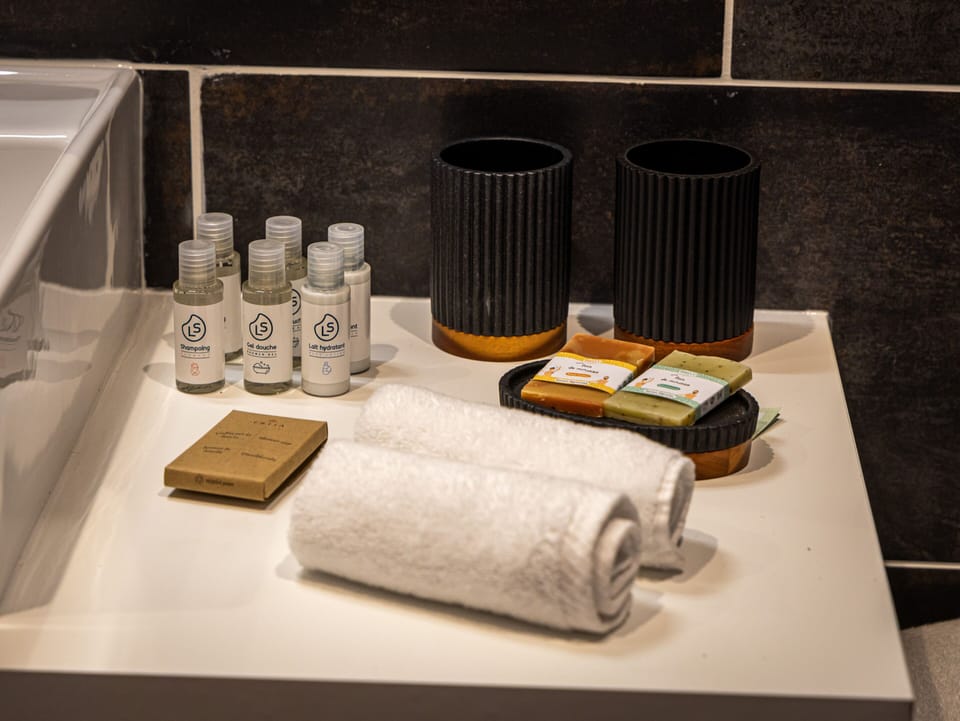 Design Apartment, Private Bathroom, Garden View (Le Temps Suspendu) | Bathroom | Slippers