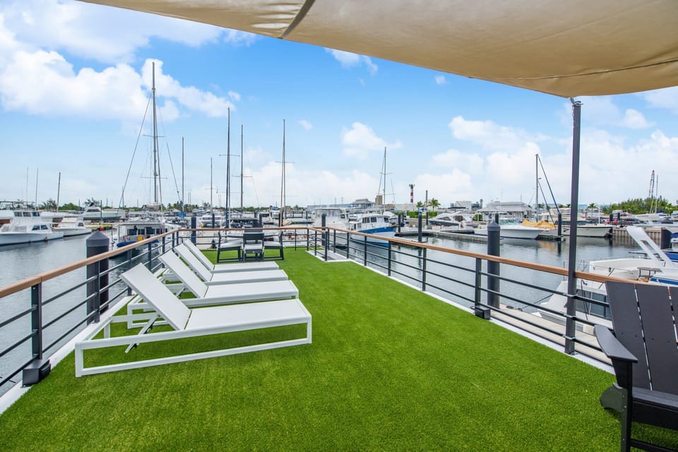 Rooftop With Lounge Chairs and Dining