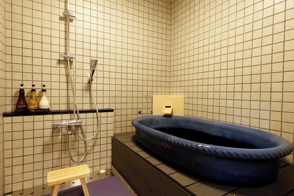 Deluxe Duplex, Private Bathroom, Garden View | Bathroom | Combined shower/tub, deep soaking tub, rainfall showerhead