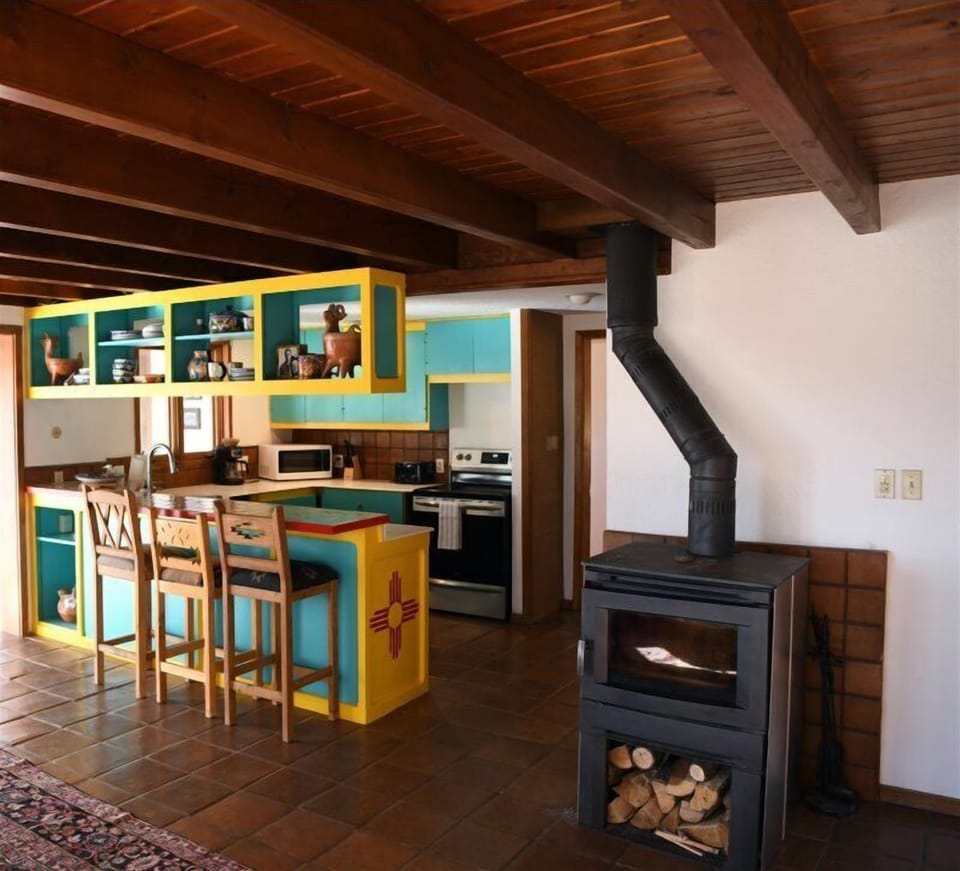 Woodstove next to kitchen