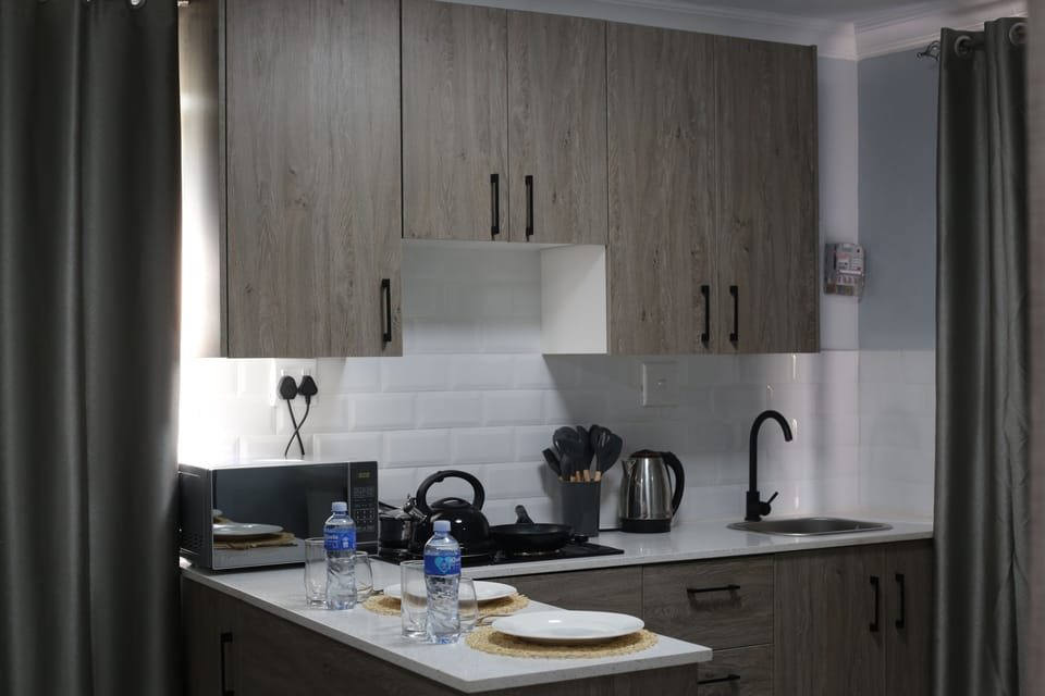 Superior Room | Private kitchen | Mini-fridge, microwave, stovetop, cookware/dishes/utensils