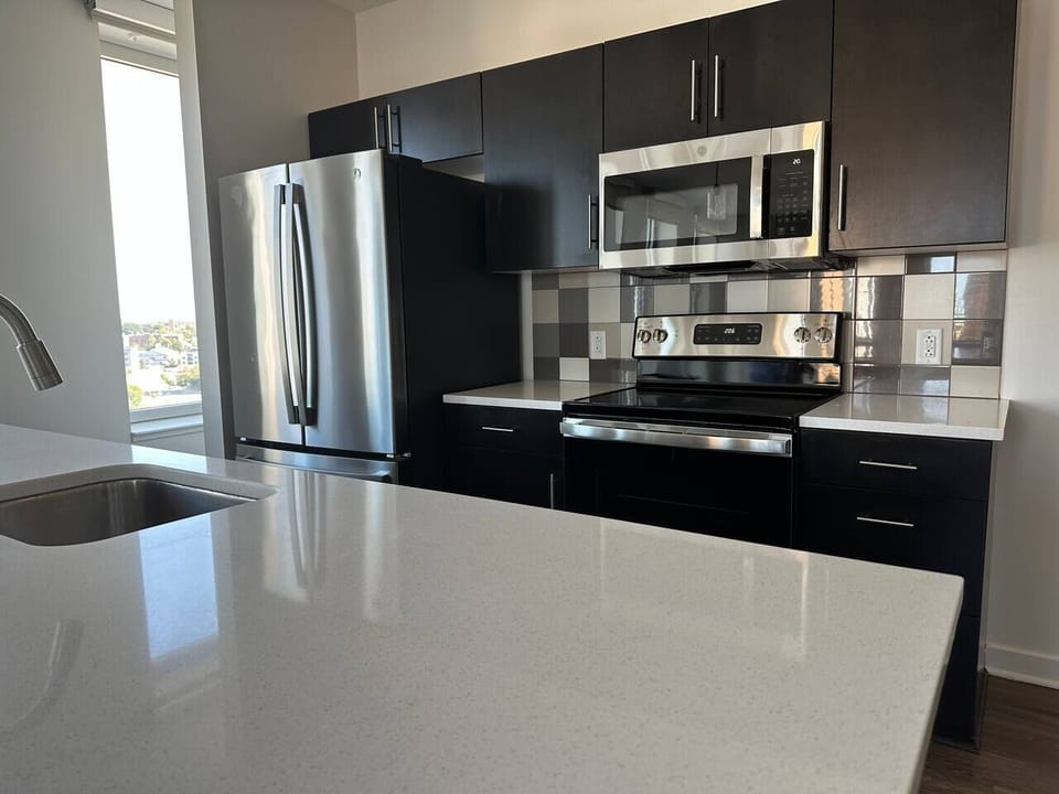 Galley kitchen with brand new stainless steel applainces