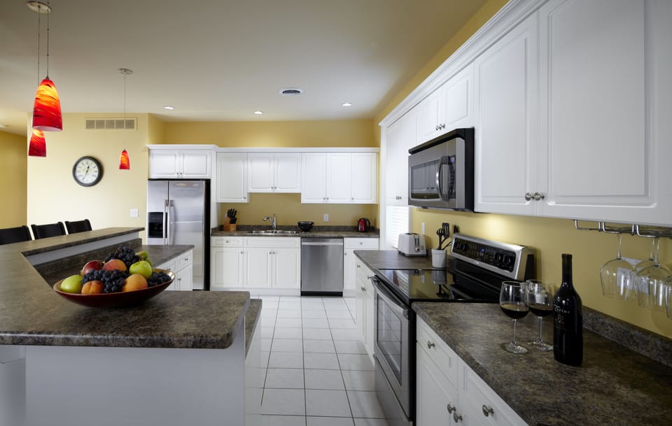 Signature Suite, 2 Bedrooms, 2 Bathrooms | Private kitchen | Full-size fridge, microwave, oven, dishwasher