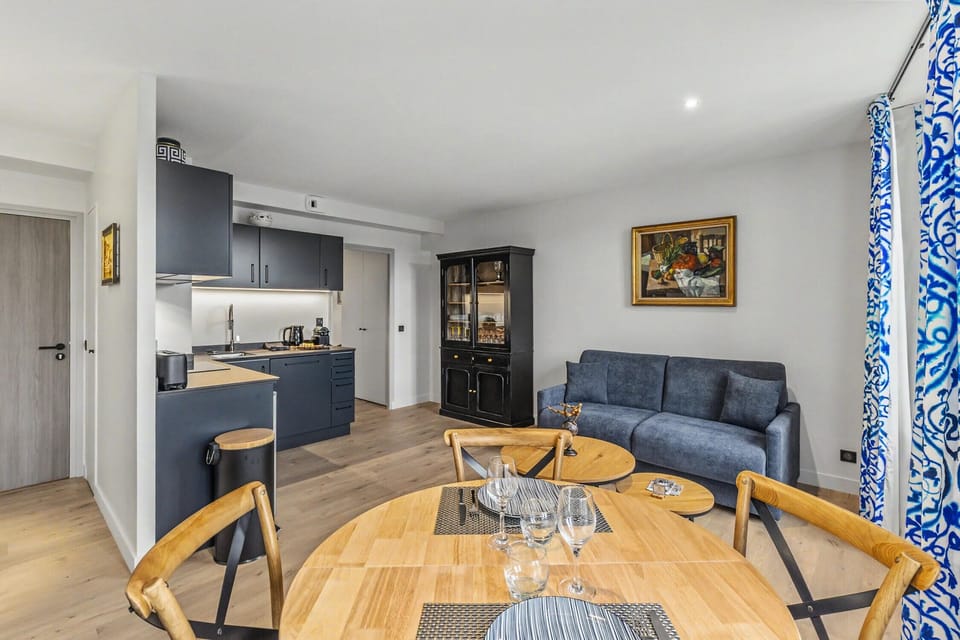 Welcoming dining area with open kitchen, great for sharing a meal.