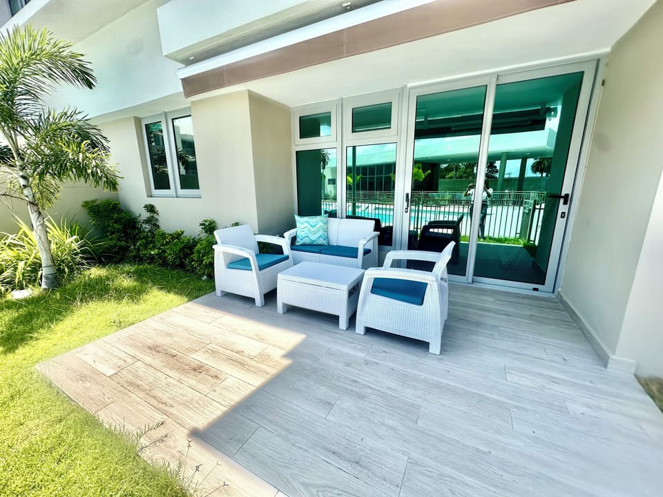 Outside terrace, overlooking and direct access to main pool
