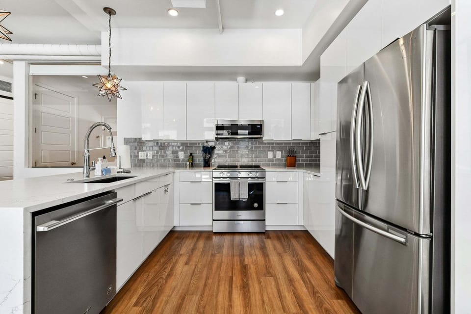 Condo, Multiple Beds, Patio, City View ((R03) 3198 Blake St. Unit 205) | Private kitchen | Fridge, microwave, oven, stovetop