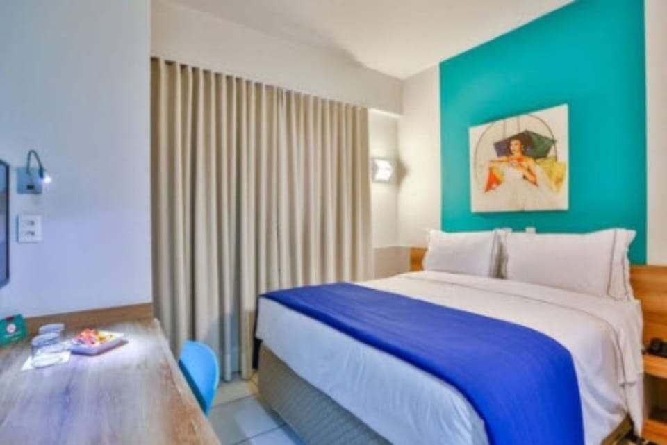 Superior Casal | Minibar, in-room safe, blackout drapes, iron/ironing board
