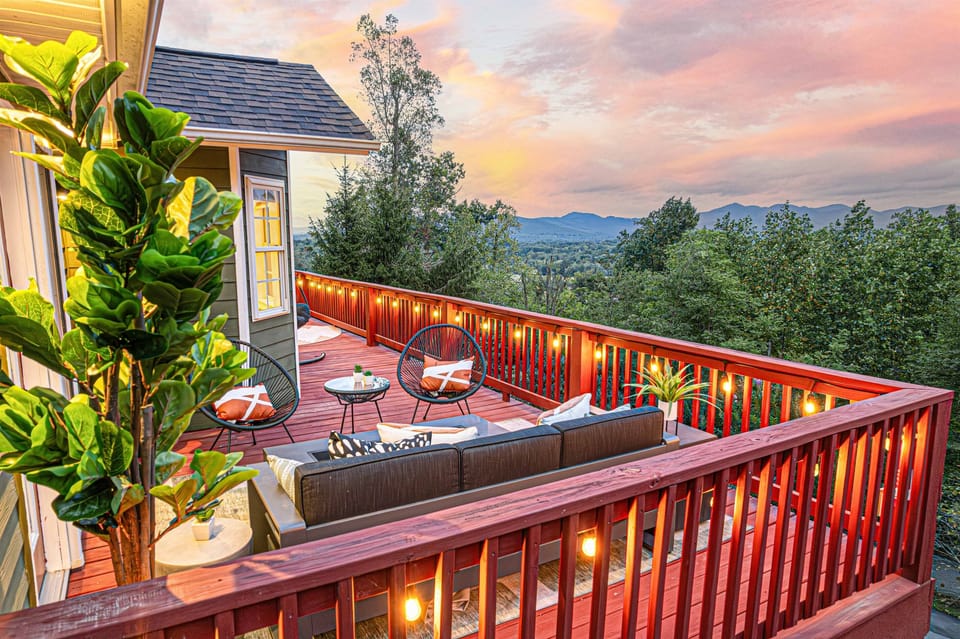 Experience the magic of twilight from above, with the property glowing under the evening sky.