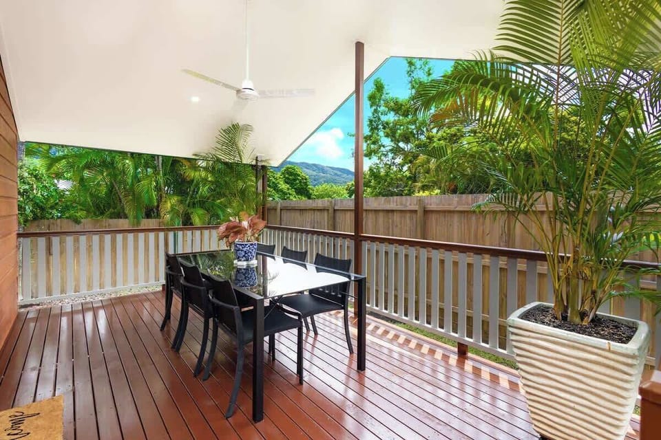 The covered patio invites slow mornings with coffee or relaxed sunset dinners fresh from the Weber BBQ, all framed by tranquil mountain views.