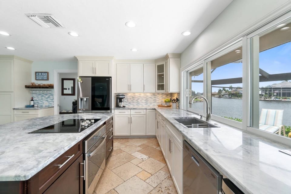 The kitchen is fully equipped and ready for any cooking or cocktailing endeavor.
