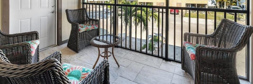 Patio of unit 1, featuring ample seating