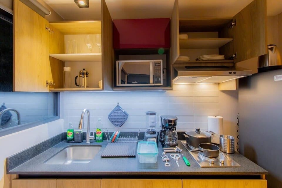Prepare meals with ease in our stocked kitchen.


