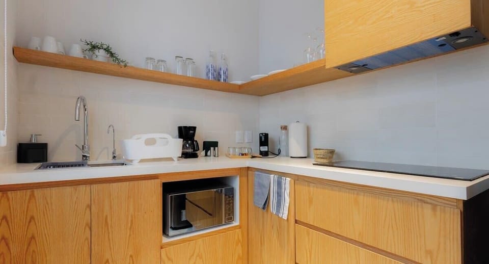 Cook, dine, and unwind in our cozy kitchen space.
