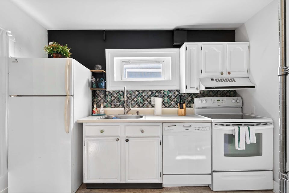 Kitchen: From quick snacks to family dinners, this kitchen is equipped with everything needed to make your stay comfortable and convenient.