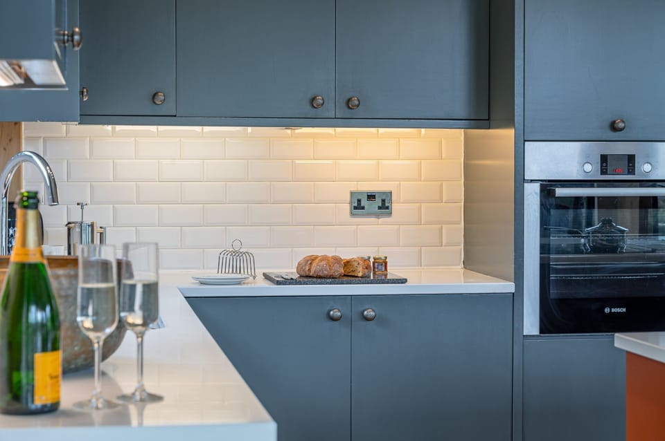 Kitchen in William lodge at Brompton Lakes modern appliances and spacious open-plan layout.