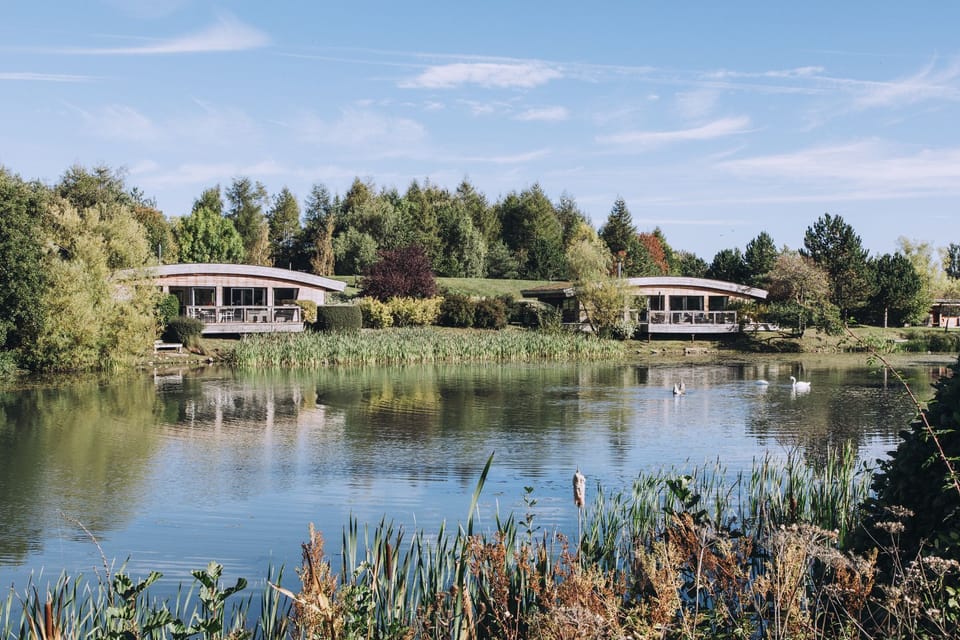 Exterior of luxury lakeside lodges at Brompton Lakes, North Yorkshire.